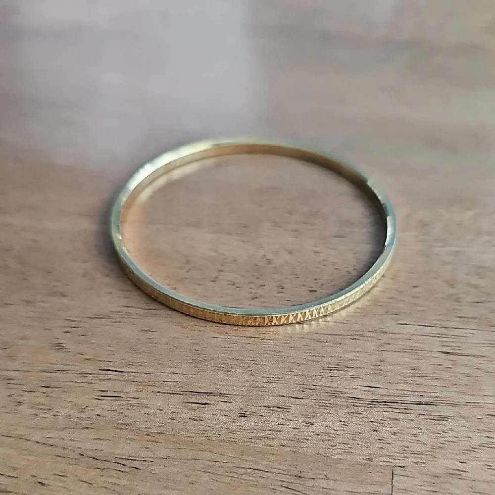Trifari Elegant Gold Tone Bangle Bracelet
